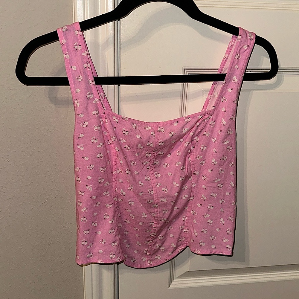 This is a pink crop top from Hollister